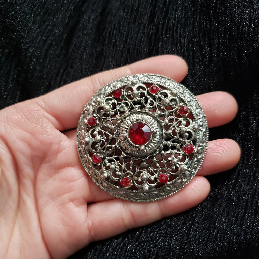 Vintage Large Round Silver Tone Red Ruby Rhinestone Filigree Pin Brooch